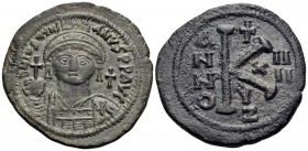 Justinian I, 527-565. Half Follis (Copper, 30 mm, 11.41 g, 6 h), Cyzicus, regnal year 14 = 540/1. D N IVSTINI-ANVS P P AVC Helmeted and cuirassed bust...