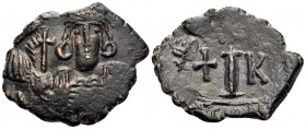 Constantine IV Pogonatus, 668-685. Decanummium (Bronze, 25 mm, 5.27 g, 7 h), Constantinople, 668-673. Helmeted and cuirassed bust of Constantine facin...