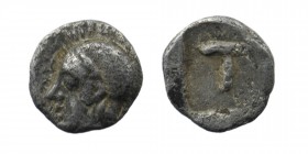 Arkadia, Tegea. Ca. 423-400 B.C. AR tetartemorion. 
Helmeted head of Athena Alea left.
Rev: T within shallow incuse square. 
BCD Peloponnesos 1721; HO...