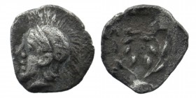 Aeolis, Elaia AR Hemiobol. Circa 350-320 BC. 
Helmeted head of Athena left, pellet behind / Olive wreath
 SNG Kayhan 81
0,36 gr. 9 mm