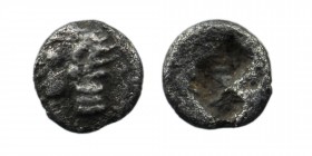 Ionia. Phokaia circa 500 BC.
Tetartemorion AR
6mm., 0,19g.
Archaic head of Athena(?) left / Four-part incuse punch.
0,17 gr. 6 mm