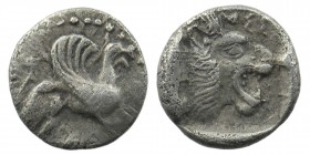 TROAS, Assos. Circa 405-360 BC. AR Obol
Chian standard. Griffin lying right / Head of lion right within incuse square. 
SNG Arikantürk 281–7; SNG Ashm...