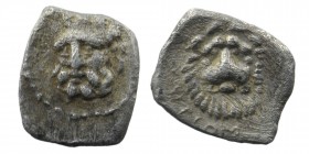 Cilicia, Isaura Palaia AR Hemiobol. Circa 333-322 BC. 
Obv: Head of Herakles facing slightly left.
Rev: Facing lion's head; YΛYPCOM(sic) below. 
Göktü...
