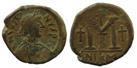 Justinian I. AD 527-565. Nikomedia Follis. AE
Obv: D N IVSTINIANVS P..., pearl diademed, draped, cuirassed bust right.
Rev: Large M, cross to left and...