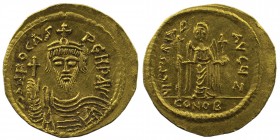 PHOCAS. 602-610 AD. Constantinople . AV Solidus 
oN FOCAS PER P AVC, short-bearded, crowned, draped, and cuirassed bust of Phocas facing, holding glob...