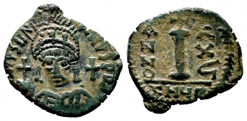 Justinian I. 527-565. AE half follis
Condition: Very Fine

Weight: 4.20 gr 
Diam...