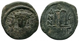 Tiberius II Constantine. 578-582. AE
Condition: Very Fine

Weight: 11.30 gr 
Diameter: 30 mm