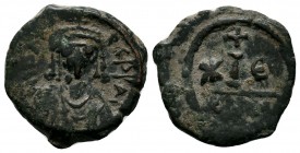 Tiberius II. Constantinus, 578 - 582 AD, Ae
Condition: Very Fine

Weight: 3.40 gr 
Diameter: 18 mm