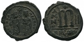 Phocas with Leontia (602-610 AD). AE Follis
Condition: Very Fine

Weight: 11.00 gr 
Diameter: 29 mm