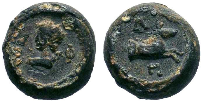 Roman lead seal of Philippos
(ca 2nd-4th cent. AD)
Obv.: Men's bust to left, bet...