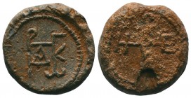 Byzantine lead seal of an uncertain officer
(6th cent.)
Obv.: Invocative cruciform monogram, ΘΕΟΤΟΚΕ ΒΟΗΘΕΙ (Mother of God, help), wreath border.

Rev...