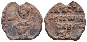 Byzantine lead seal of N. imperial protospatharios 
and in charge of oikiakon
(11th cent.)
Obv.: Bust of the Mother of God, facial, nimbate, with chil...
