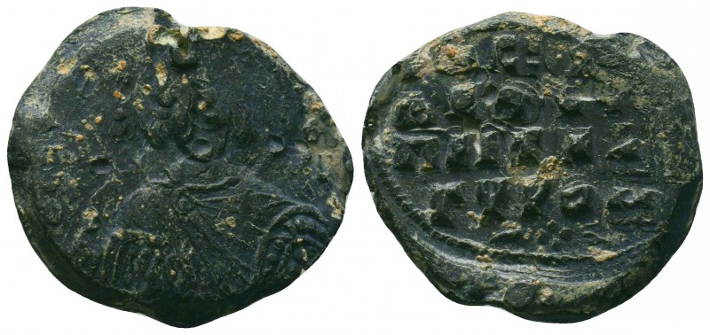 Byzantine lead seal of an uncertain officer
(ca 11th cent.)
Obv.: Bust of saint ...
