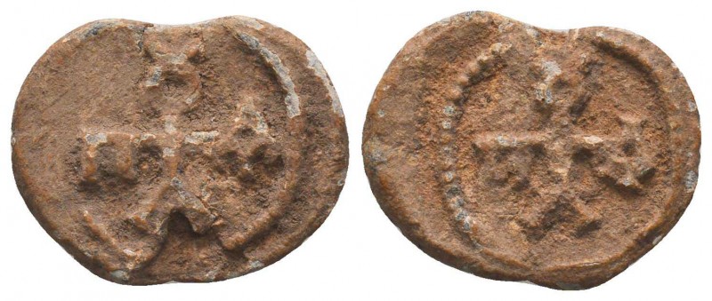Byzantine lead seal of Paul officer
(6th cent.)
Obv.: Cruciform monogram, resolv...