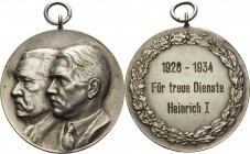 Drittes Reich
 Versilberte Bronzemedaille o.J. (graviert 1934) (unsigniert) Verdienstmedaille. Brustbilder von Hindenburg und Hitler nebeneinander na...