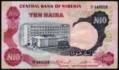 Nigeria 10 Naira 1973-78
P# 17c; № DD93-448028; Carmine and dark blue on multicolor underprint. Bank building at left center. Back: Carmin. Dam at ce...