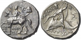 Calabria, Tarentum. Nomos circa 240-228 BC, AR 6.80 g. Cuirassed and cloaked soldier on horse l., raising r. hand; in upper r., TPK monogram and pileu...