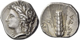 Metapontum. Nomos circa 330-290, AR 7.89 g. Head of Demeter l., wearing earring and barley wreath. Rev. META Ear of barley, with leaf to l. which pass...