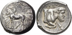 Gela. Tetradrachm circa 420-415, AR 17.44 g. Slow quadriga driven l. by charioteer holding kentron and reins; above, Nike flying l. to crown the horse...