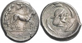 Syracuse. Tetradrachm circa 480-475, AR 17.35 g. Slow quadriga driven r. by charioteer holding kentron and reins; above, Nike flying r. to crown the h...