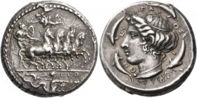 Syracuse. Tetradrachm signed by Euth… and Phrygillos circa 405, AR 17.38 g. Fast quadriga driven r. by naked and winged daimon holding reins with both...