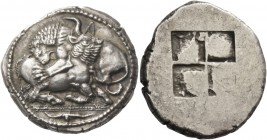 Macedonia, Acanthus. Tetradrachm, circa 525-470, AR 16.74 g. Lion l., attacking bull kneeling r. and biting into its hindquarters; above, A and in exe...