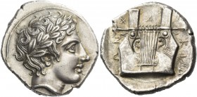 Olynthus. Tetradrachm, circa 410-401, AR 14.45 g. Laureate head of Apollo r. Rev. X – A – Λ / ΚΙΔ / ΕΩΝ Eight-stringed cithara. SNG Lockett 1308 (this...