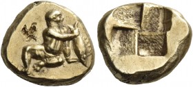 Mysia, Cyzicus. Hecte, circa V-IV century BC, EL 2.59 g. Boy seated facing, head r., legs splayed to l., holding in his r. hand a tunny fish by the ta...