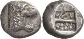 Islands of Caria, Lindos. Stater, circa 515/510-475, AR 13.45 g. Lion’s head r., with open jaws and protruding tongue. Rev. Rectangular incuse square,...