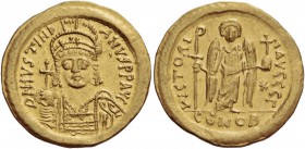 Justinian I, 527 – 565. Solidus 545-565, AV 4.45 g. D N IVSTINI – ANVS P P AVG Helmeted, pearl-diademed and cuirassed bust three-quarters facing, hold...
