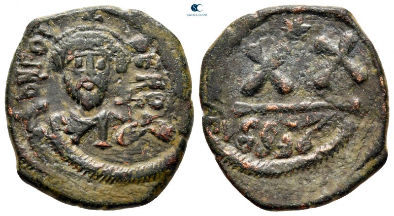 Phocas AD 602-610. Constantinople
Half follis Æ

22 mm., 5,64 g.



very ...