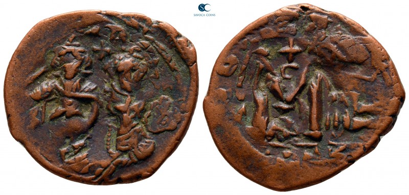 Heraclius with Heraclius Constantine AD 610-641. Constantinople
Follis Æ

27 ...
