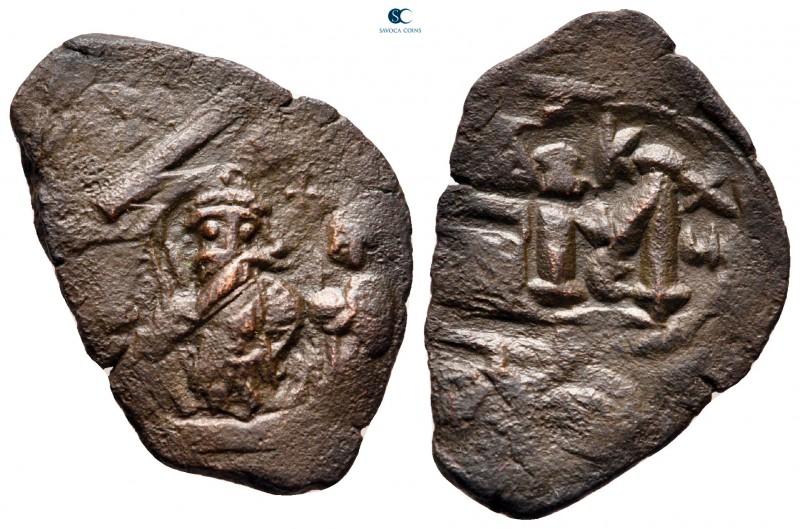 Heraclius with Heraclius Constantine AD 610-641. Constantinople
Follis Æ

28 ...