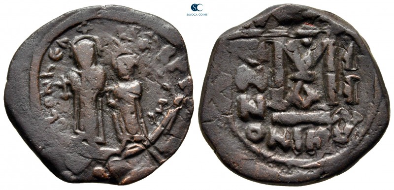 Heraclius with Heraclius Constantine AD 610-641. Nikomedia
Follis Æ

27 mm., ...