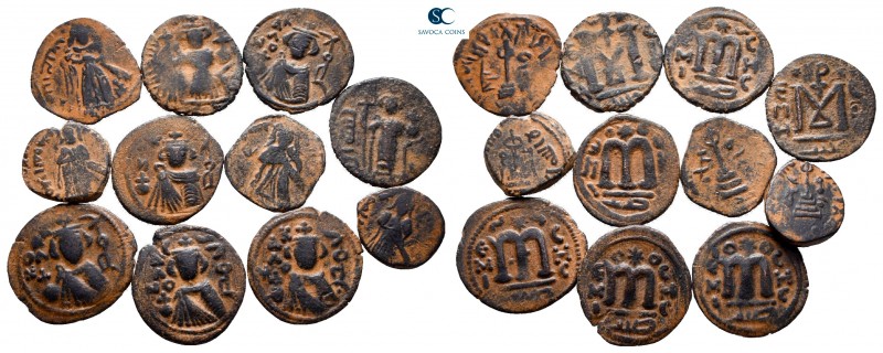 Lot of ca. 12 arab-byzantine bronze coins / SOLD AS SEEN, NO RETURN!

very fin...