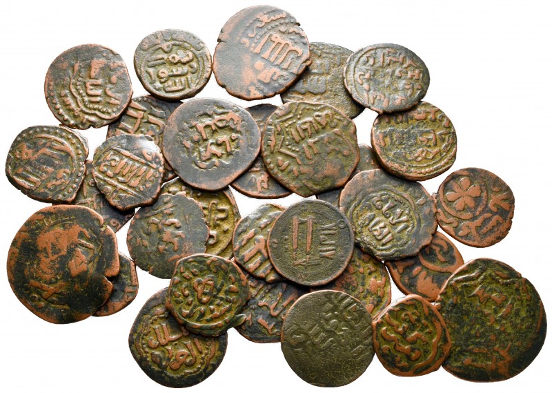 Lot of ca. 30 islamic bronze coins / SOLD AS SEEN, NO RETURN!

nearly very fin...