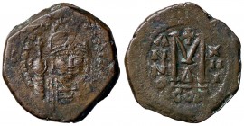 BIZANTINE - Maurizio Tiberio (582-602) - Follis - Busto coronato di fronte con globo crucigero /R Lettera M sormontato da croce Sear 494 (AE g. 11,88)...