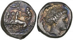 Sicily, Panormus, tetradrachm, c. 350 BC, quadriga driven left; sign of Tanit in central field has been added to the die, rev., head of Tanit right we...