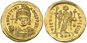 Justinian I (527-565), solidus, Constantinople, bust facing holding globus cruciger and shield, rev., angel standing facing holding long staff surmoun...