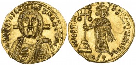 Justinian II, 1st reign (685-695), solidus, Constantinople, bust of Christ facing with cross behind head, holding book of Gospels and raising right ha...