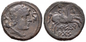 Arekoratas. As. 150-20 a.C. Ágreda (Soria). (Abh-120). Anv.: Cabeza masculina a derecha, entre dos delfines. Rev.: Jinete con lanza, debajo ARECOR / A...
