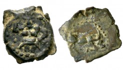 Ebusus. 1/8 calco. 200-100 a.C. Ibiza. (Abh-924). Anv.: Bes de frente sosteniendo un martillo y una serpiente. Rev.: Toro embistiendo a derecha. Ae. 1...