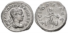 Eliogábalo. Denario. 218-222 d.c. Roma. (Spink-7554). (Ric-161). (Seaby-300a). Rev.: VICTORIA AVG. Victoria en vuelo a izquierda, entre dos escudos y ...