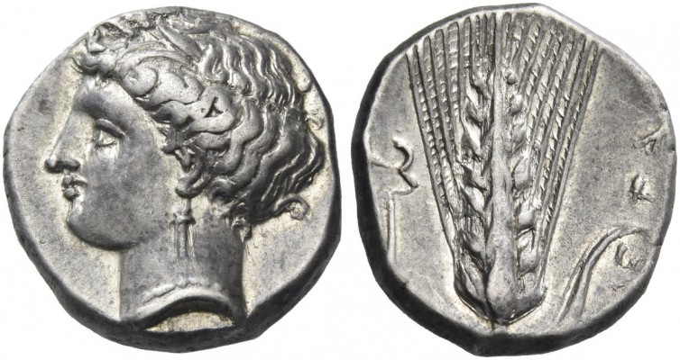Metapontium. Nomos circa 340-330 BC, AR 7.85 g. Head of Demeter l., hair tucked ...