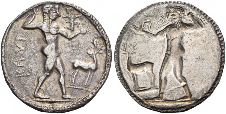 Bruttium, Caulonia. Nomos circa 525-500 BC, AR 7.78 g. Apollo, diademed, walking...