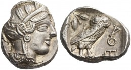 Attica, Athens. Tetradrachm after 449 BC, AR 17.19 g. Head of Athena r., wearing Attic helmet decorated with olive leaves and palmette. Rev. Owl stand...
