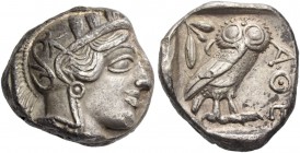 Attica, Athens. Tetradrachm after 449 BC, AR 17.14 g. Head of Athena r., wearing Attic helmet decorated with olive leaves and palmette. Rev. Owl stand...