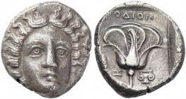 Islands off Caria, Rhodes. Tetradrachm circa 385-360 BC, AR 14.76 g. Head of Helios facing slightly r. Rev. Rose with bud to left; in l. field, Z and ...