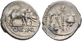 Iulius Caesar. Denarius, Gallia Narbonensis, Hispania Citerior 49. AR 3.96 g. Pontifical emblems: culullus, aspergillum, axe and apex. Rev. Elephant r...