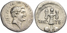 Marcus Antonius. Denarius, mint moving with M. Antonius 37, AR 3.18 g. ANT AVG·III·VIR·R·P·C Head of M. Antonius r. Rev. IMP – TER Trophy; at base, tw...